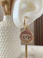 Gold and pink earrings