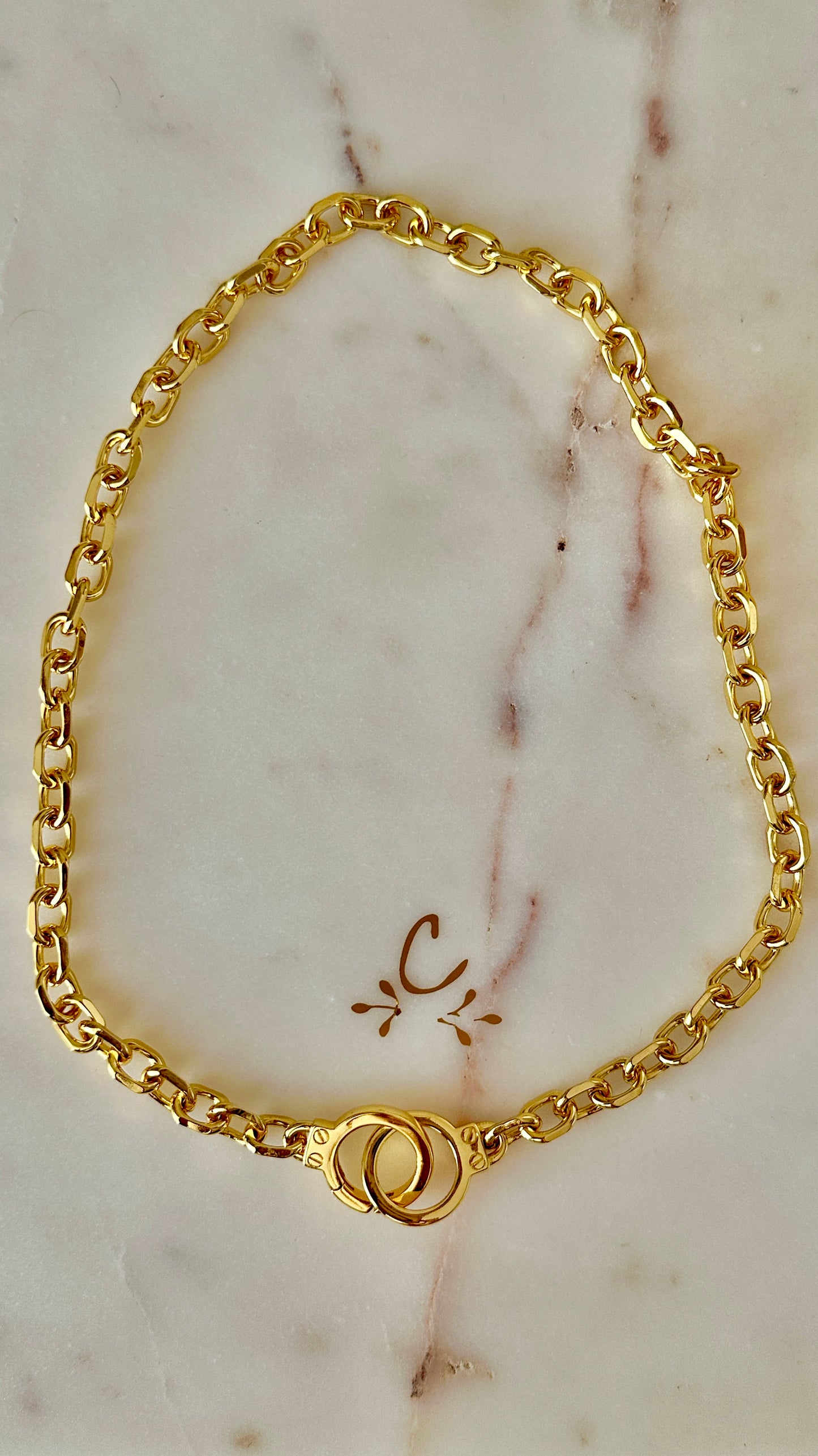 Gold handcuffs necklace